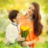 26567847-Son-hugging-his-mother-and-gives-her-flowers.jpg